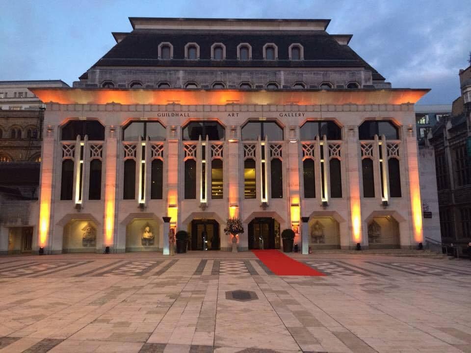 Luxury chauffeur vehicle parked at Guildhall red carpet for a VIP event.