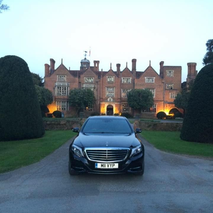 Luxury chauffeur car waiting outside a hotel to transfer VIP clients to Gatwick Airport
