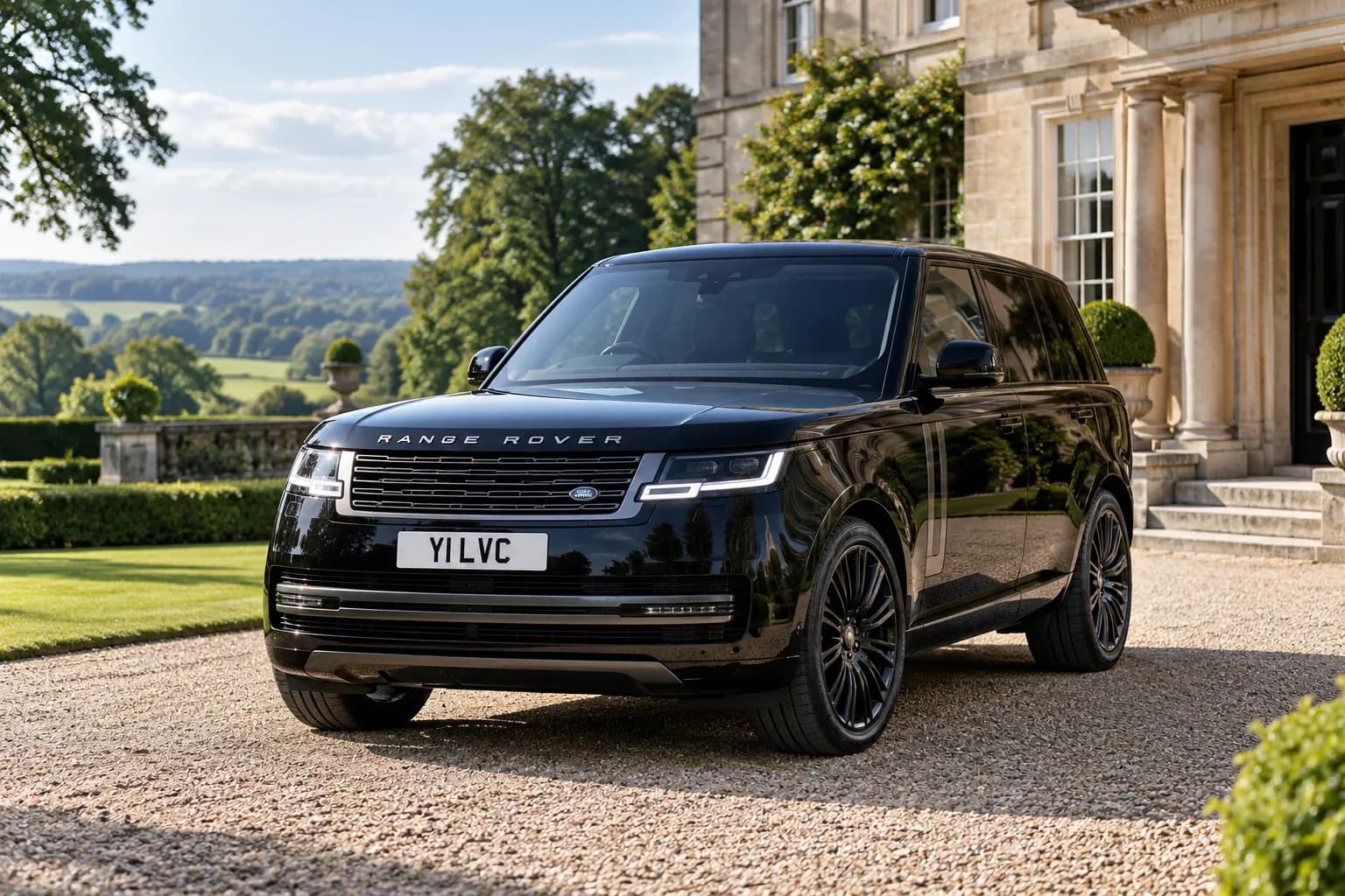 Black Range Rover Autobiography outside an English country house
