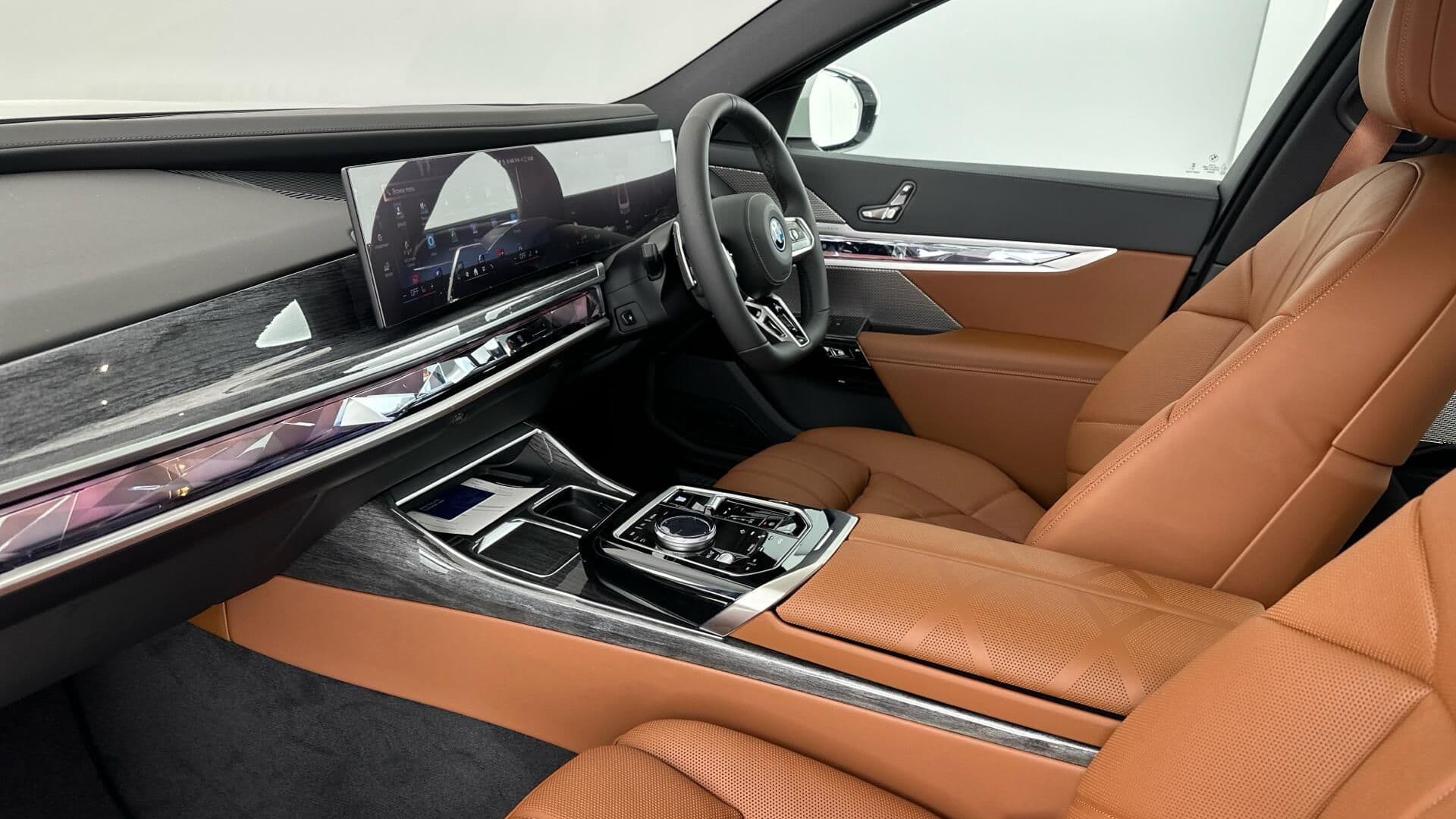 Elegant interior cabin of the BMW 7 Series designed for VIP chauffeur travel in London.