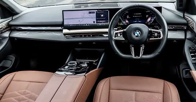 Premium leather interior of the BMW 5 Series business class chauffeur vehicle.