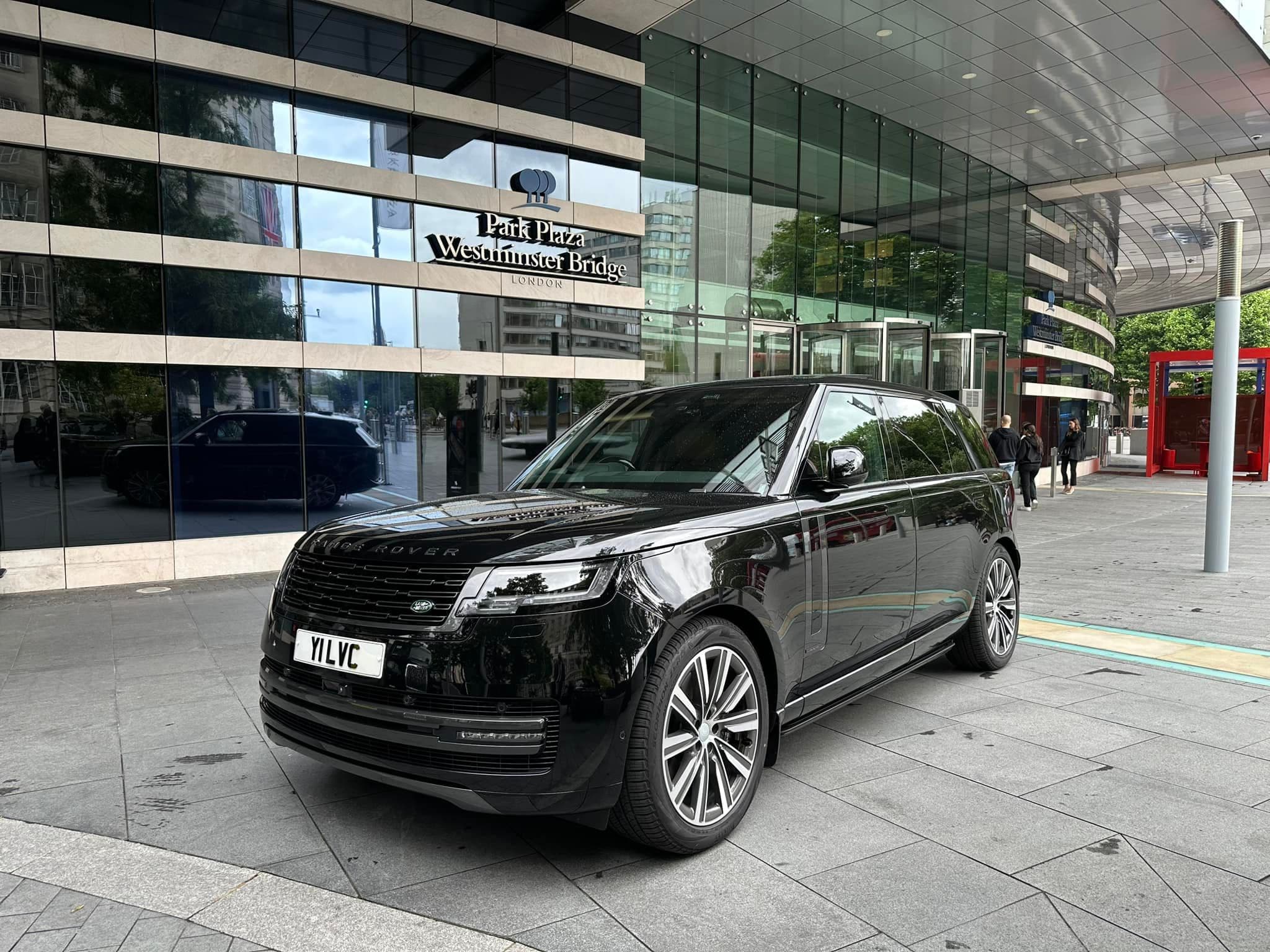 Luxury chauffeur car outside London Westminster Plaza taking clients to the theatre