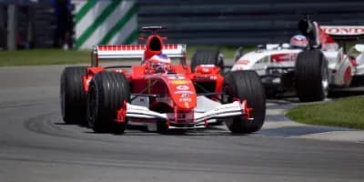 Formula One car racing on the Silverstone Circuit, showcasing high-speed motorsport action in the UK.
