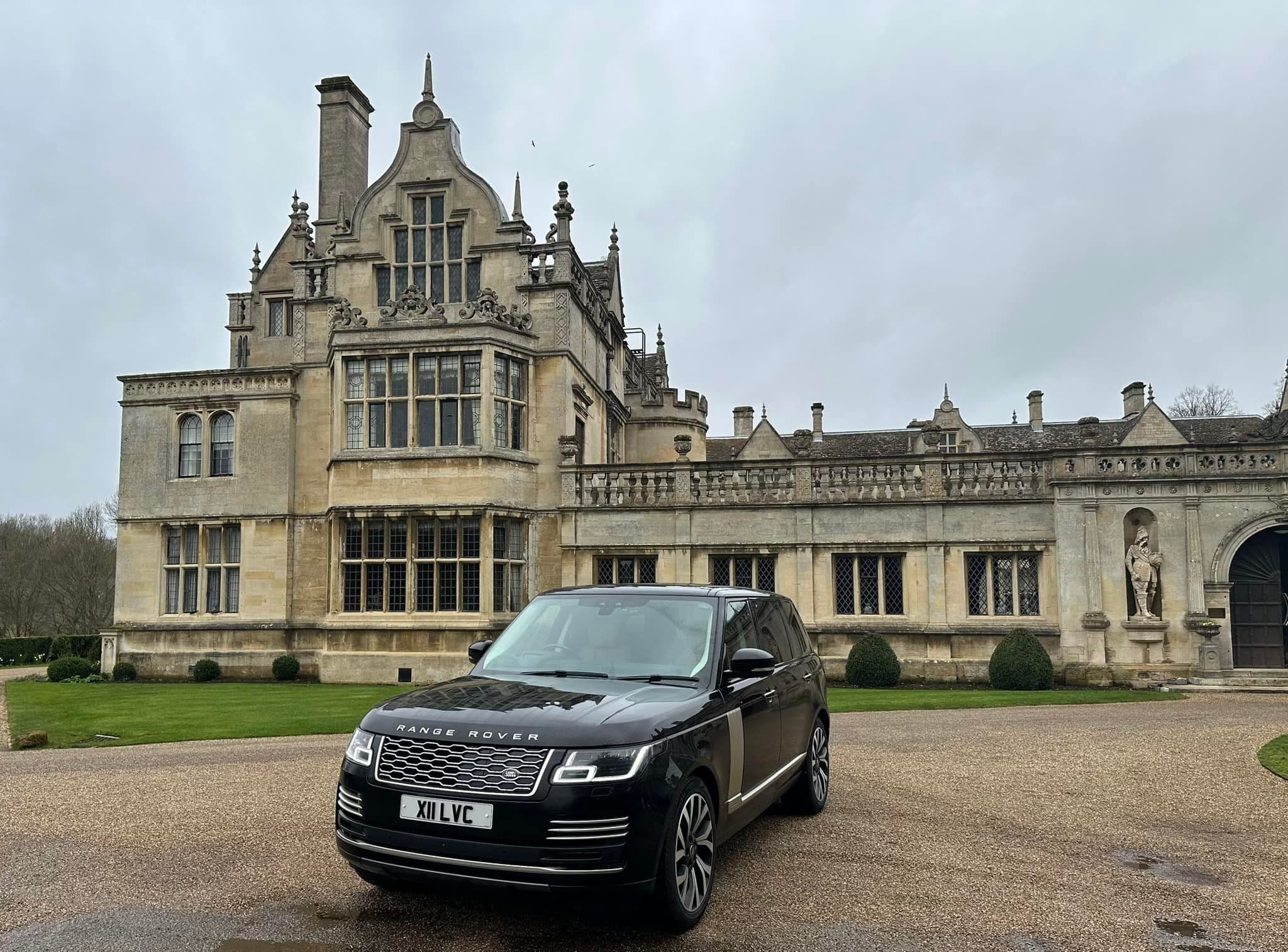 Luxury car waiting outside a countryside hotel, ready to take clients to London West End