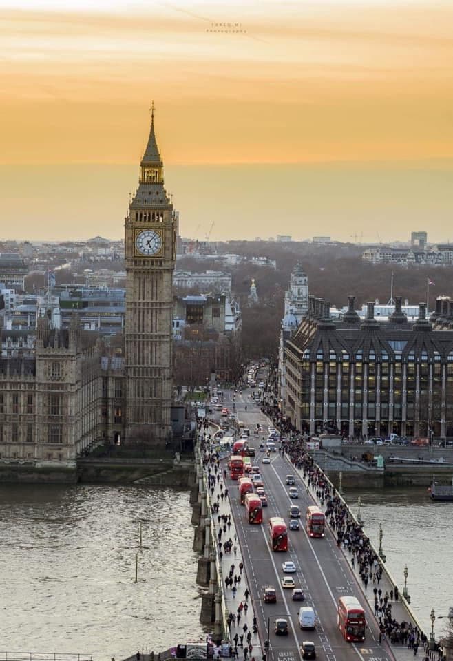 Luxury chauffeur-driven Mercedes-Benz parked in front of Big Ben and Westminster Palace in London
