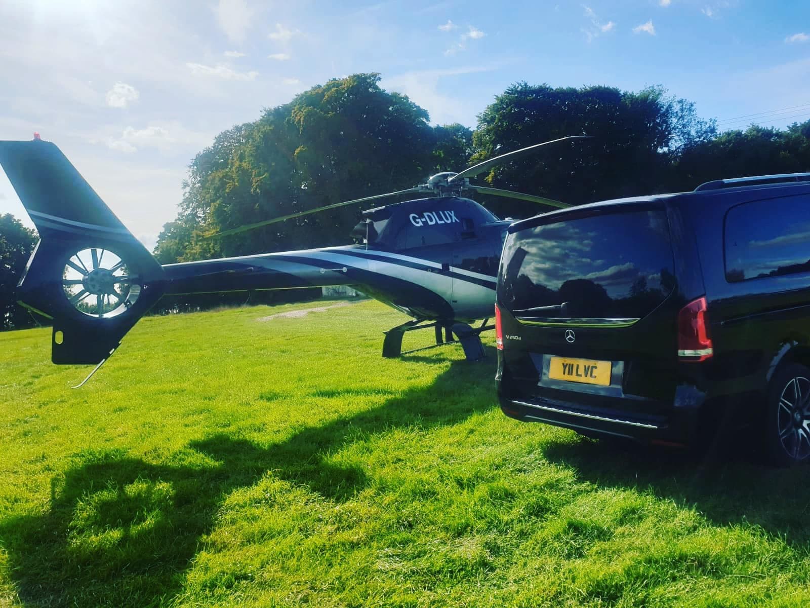 Mercedes-Benz V-Class luxury van picking up corporate client from a helicopter for VIP transfer