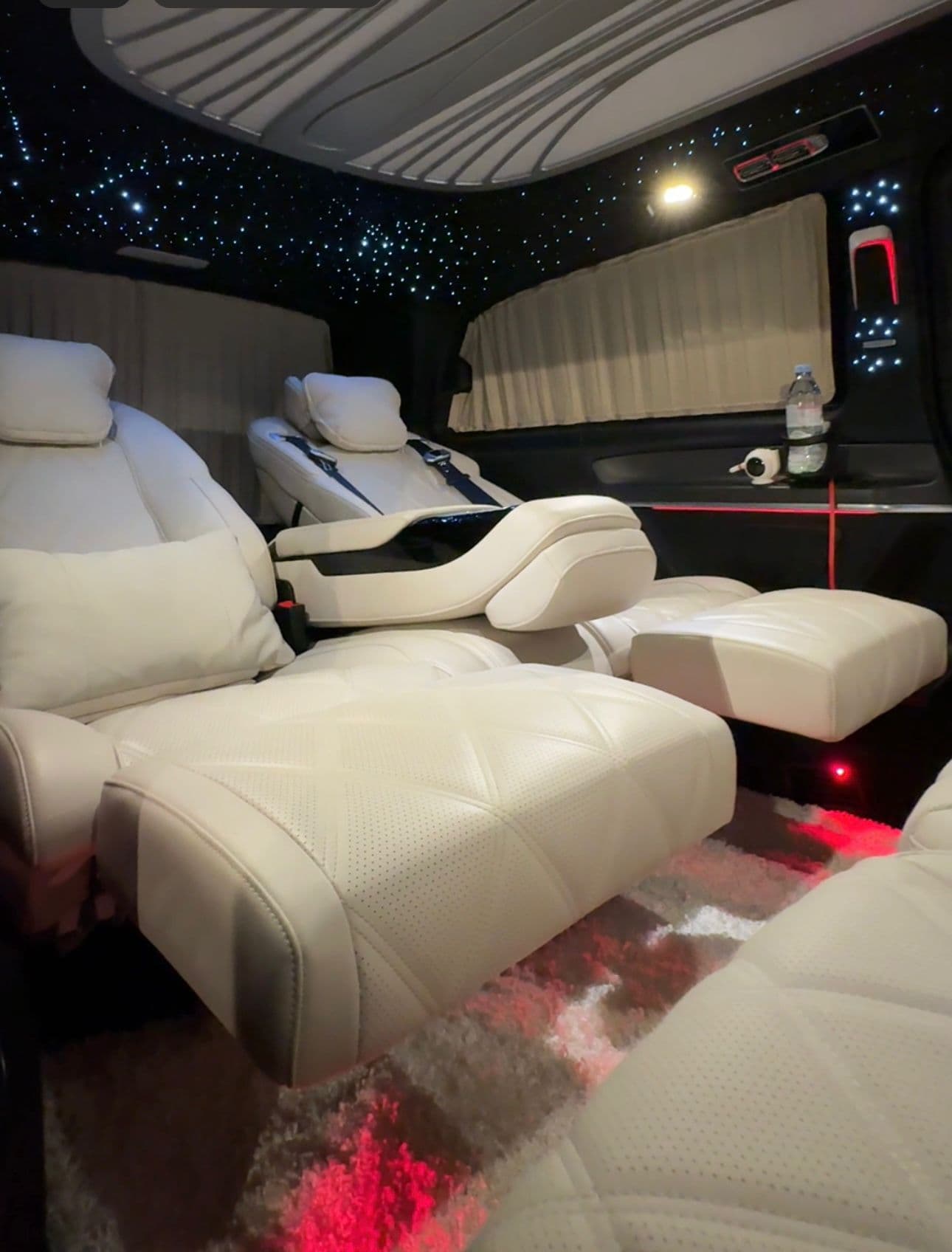 Luxury Mercedes V-Class interior with comfortable reclining seats for Stansted Airport transfer