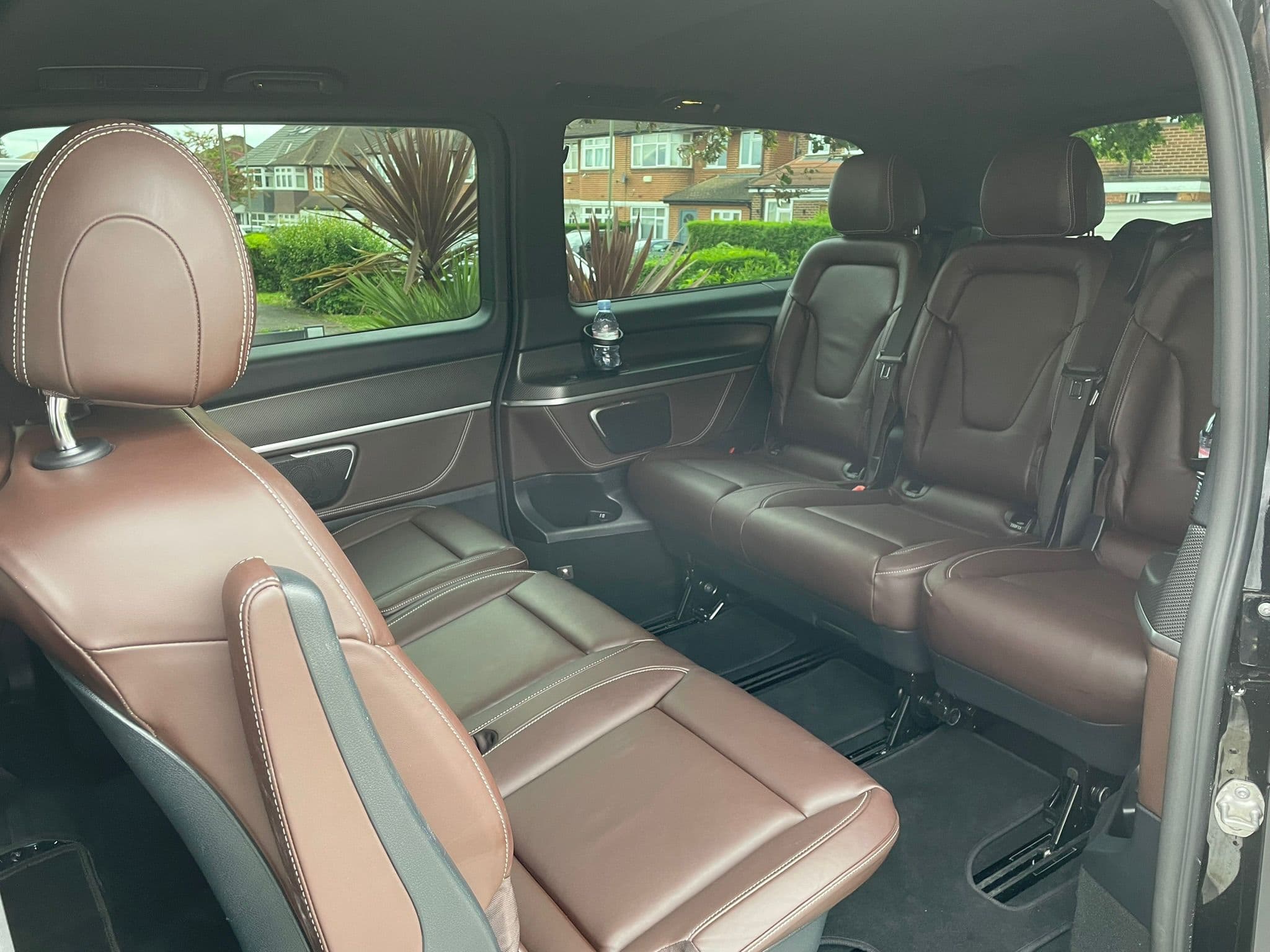 Interior of a Mercedes-Benz V-Class luxury van prepared for passenger transfers at Dover Cruise Terminal