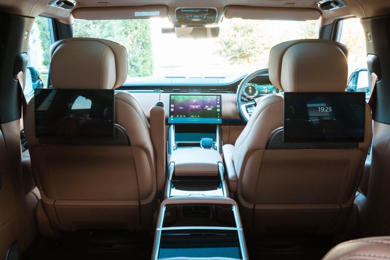 Luxury SUV interior prepared for a comfortable airport transfer with chauffeur service