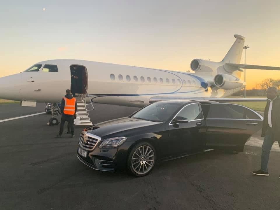 VIP client entering a Mercedes-Benz S-Class at Harrods Aviation Luton for a private jet transfer